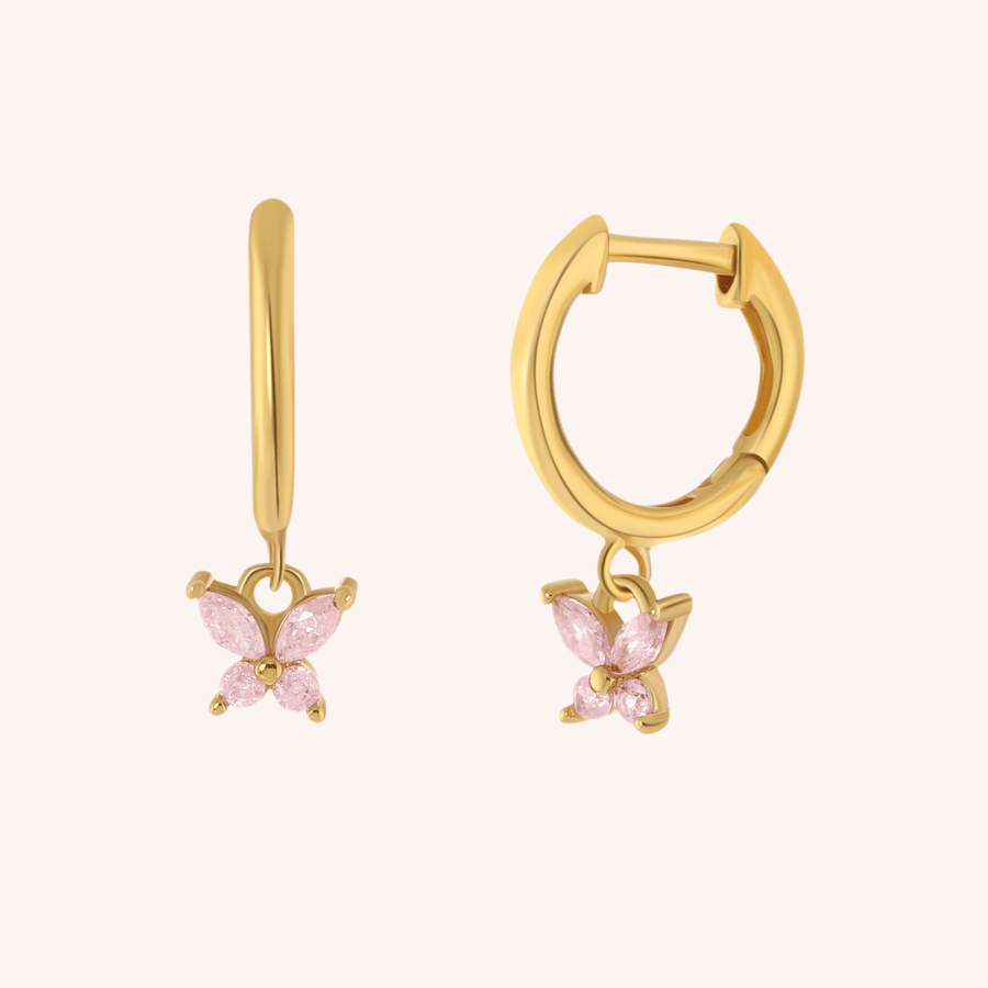 gold plated huggies with pink ice dangle charm